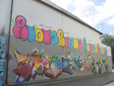 Colorful Stylewriting by Riots. This Graffiti is located in Cardiff, United Kingdom and was created in 2009. This Graffiti can be described as Stylewriting and Handstyles.