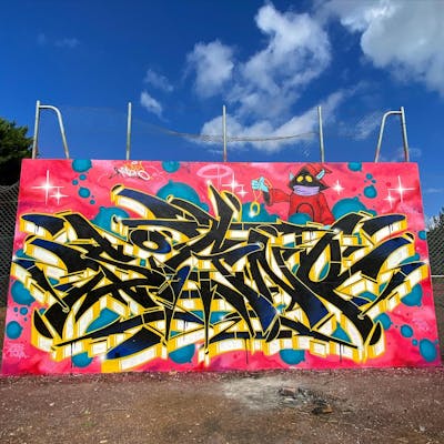 Yellow and Black and Coralle Stylewriting by Signo. This Graffiti is located in France and was created in 2023. This Graffiti can be described as Stylewriting and Characters.