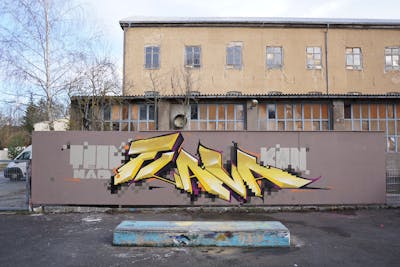 Yellow Stylewriting by TMF and Kan. This Graffiti is located in Weimar, Germany and was created in 2020. This Graffiti can be described as Stylewriting and 3D.