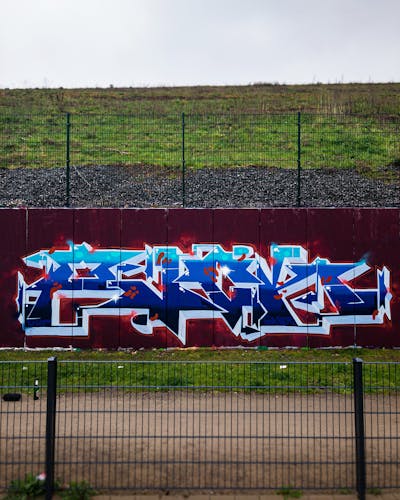Blue and White and Red Stylewriting by PUCK. This Graffiti is located in cologne, Germany and was created in 2023. This Graffiti can be described as Stylewriting and Wall of Fame.