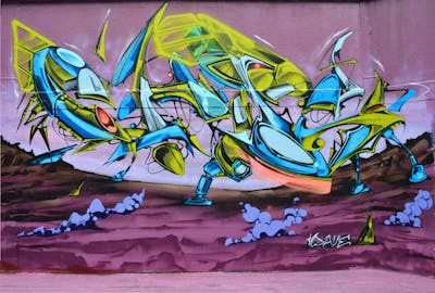Light Blue and Yellow and Violet Stylewriting by Chips and CDSK. This Graffiti is located in London, United Kingdom and was created in 2023. This Graffiti can be described as Stylewriting, 3D and Characters.