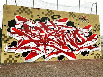 Beige and Red and White Stylewriting by Signo. This Graffiti is located in France and was created in 2023.