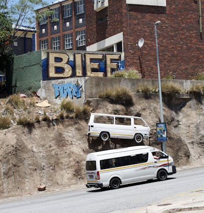 Beige and Blue Stylewriting by Bief37. This Graffiti is located in Gqeberha, South Africa and was created in 2019. This Graffiti can be described as Stylewriting and Street Bombing.