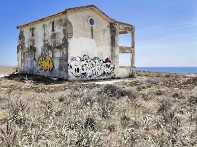 Yellow and Chrome Stylewriting by Shuen_STBcew and Classiks. This Graffiti is located in Lemnos, Greece and was created in 2022. This Graffiti can be described as Stylewriting and Abandoned.