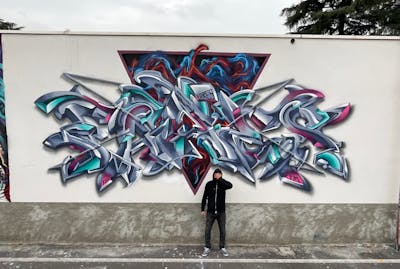 Colorful and Grey Stylewriting by Fares. This Graffiti is located in Milano, Italy and was created in 2022. This Graffiti can be described as Stylewriting, 3D and Futuristic.
