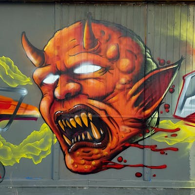 Orange Characters by angst. This Graffiti is located in Bitterfeld, Germany and was created in 2022.