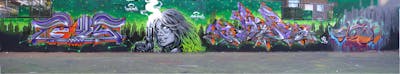 Violet and Light Green and Colorful Stylewriting by smo__crew, TUIS, hertse1 and Chips. This Graffiti is located in London, United Kingdom and was created in 2017. This Graffiti can be described as Stylewriting, Characters and Wall of Fame.