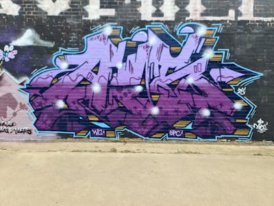 Violet Stylewriting by DPC, TWO, Aisone and WC. This Graffiti is located in Leicester, United Kingdom and was created in 2024.