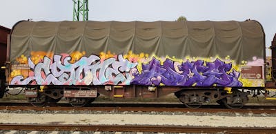 Colorful Stylewriting by Rave, Angel, DCK and Cyone. This Graffiti is located in Hungary and was created in 2020. This Graffiti can be described as Stylewriting, Trains and Freights.