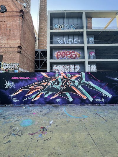 Violet and Colorful Stylewriting by Abik. This Graffiti is located in Barcelona, Spain and was created in 2022. This Graffiti can be described as Stylewriting and Wall of Fame.