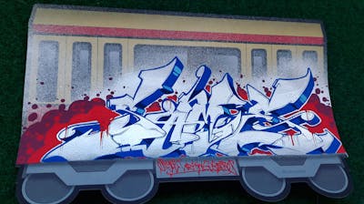 Chrome and Blue and Red Blackbook by 18K crew and Dekster. This Graffiti is located in Berlin, Germany and was created in 2023. This Graffiti can be described as Blackbook and Special.