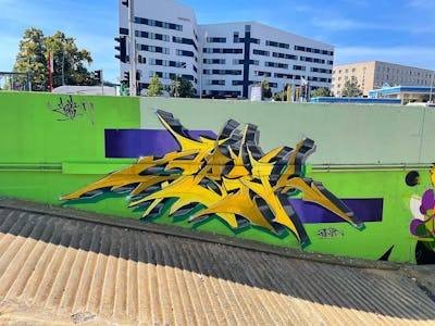 Yellow and Light Green Stylewriting by Abik. This Graffiti is located in Hamburg, Germany and was created in 2022.