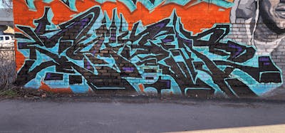 Black and Cyan Stylewriting by Chew. This Graffiti is located in United States and was created in 2024.