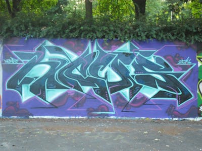 Cyan and Violet Stylewriting by News. This Graffiti is located in Tilburg, Netherlands and was created in 2014. This Graffiti can be described as Stylewriting and Wall of Fame.