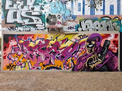 Colorful and Violet Stylewriting by ESSEX, TNC and MOC. This Graffiti is located in Australia and was created in 2023. This Graffiti can be described as Stylewriting, Characters and Wall of Fame.