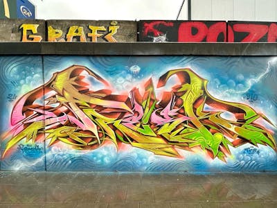 Colorful Stylewriting by Fresk. This Graffiti is located in Poznan, Poland and was created in 2024. This Graffiti can be described as Stylewriting and Wall of Fame.