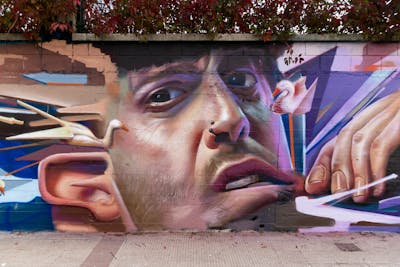 Beige and Colorful Characters by Nexgraff. This Graffiti is located in Arteaga, Spain and was created in 2022. This Graffiti can be described as Characters and Wall of Fame.
