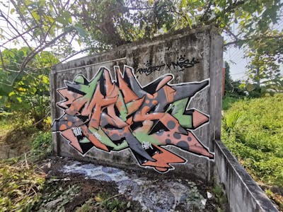 Coralle and Grey Stylewriting by Mes. This Graffiti is located in Kho Samui, Thailand and was created in 2024.