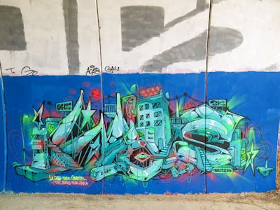 Cyan Stylewriting by Wios. This Graffiti is located in Spain and was created in 2023. This Graffiti can be described as Stylewriting, Characters and Wall of Fame.