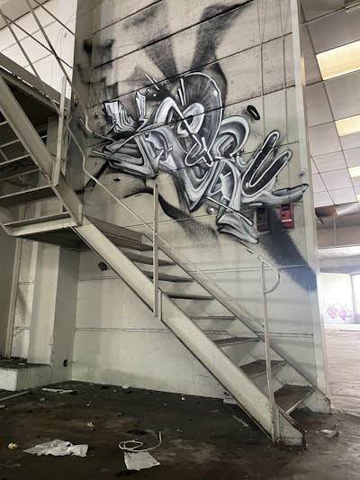 Grey Atmosphere by Ketru and Truk. This Graffiti is located in France and was created in 2023. This Graffiti can be described as Atmosphere, Stylewriting and Abandoned.