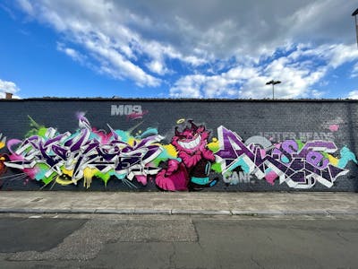 Violet and Colorful Stylewriting by FOKUS.81, AKSE and CANE ONE. This Graffiti is located in Antwerp, Belgium and was created in 2022. This Graffiti can be described as Stylewriting and Characters.