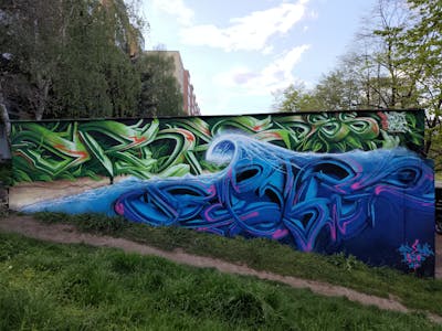 Light Blue and Light Green Stylewriting by Sainter. This Graffiti is located in Bratislava, Slovakia and was created in 2023. This Graffiti can be described as Stylewriting and 3D.