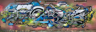 Chrome and Colorful Stylewriting by Fork Imre, AFX and ALL CAPS. This Graffiti is located in Budapest, Hungary and was created in 2021. This Graffiti can be described as Stylewriting and Futuristic.