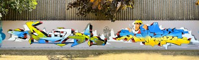 Yellow and Light Blue and Colorful Stylewriting by Rowdy, TMF and Randy. This Graffiti is located in Bremerhaven, Germany and was created in 2023. This Graffiti can be described as Stylewriting, Characters and Wall of Fame.