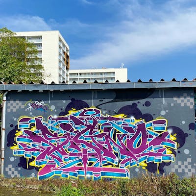 Violet and Grey and Light Blue Stylewriting by Signo. This Graffiti is located in France and was created in 2023.