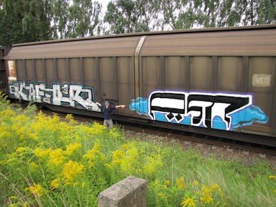 White and Colorful Stylewriting by urine, kafor and OST. This Graffiti is located in Leipzig, Germany and was created in 2011. This Graffiti can be described as Stylewriting and Trains.