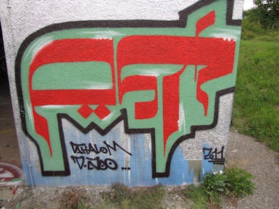 Colorful Stylewriting by Pear, OST and KCF. This Graffiti is located in Delitzsch, Germany and was created in 2011. This Graffiti can be described as Stylewriting and Street Bombing.