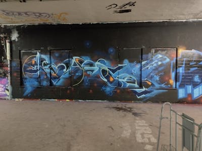 Light Blue and Black Stylewriting by Fakie. This Graffiti is located in Germany and was created in 2022. This Graffiti can be described as Stylewriting, Abandoned and Futuristic.