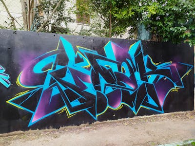 Light Blue and Black Stylewriting by CDB, MCT, BK and Noack. This Graffiti is located in Montauban, France and was created in 2021. This Graffiti can be described as Stylewriting and Wall of Fame.