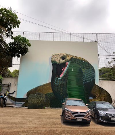 Green Characters by DUMSER1. This Graffiti is located in Lima, Peru and was created in 2022. This Graffiti can be described as Characters, Streetart and Murals.