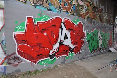 Red and Colorful Stylewriting by HAMPI and BISTE. This Graffiti is located in MÜNSTER, Germany and was created in 2019. This Graffiti can be described as Stylewriting and Wall of Fame.