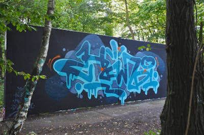Light Blue and Blue Stylewriting by HAMPI. This Graffiti is located in Lübeck, Germany and was created in 2023. This Graffiti can be described as Stylewriting and Wall of Fame.