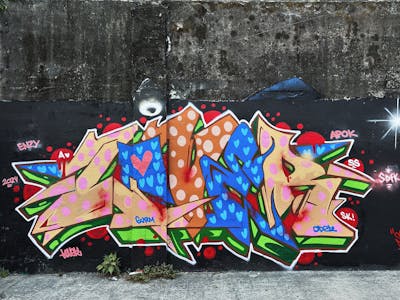 Colorful Stylewriting by SWL, SDFK and Love.r. This Graffiti is located in Makati, Philippines and was created in 2024.