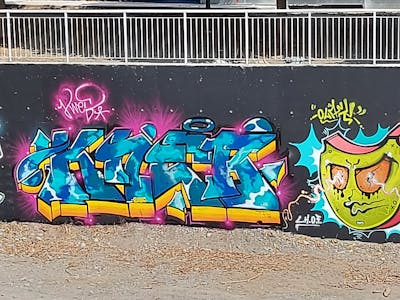 Colorful Stylewriting by KNEB. This Graffiti is located in Cyprus and was created in 2022. This Graffiti can be described as Stylewriting, Characters and Wall of Fame.