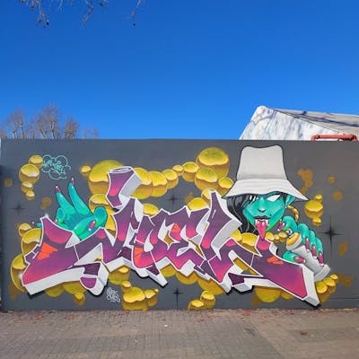 Colorful and Coralle and Yellow Stylewriting by El Joel. This Graffiti is located in Barcelona, Spain and was created in 2024. This Graffiti can be described as Stylewriting, Characters and Streetart.