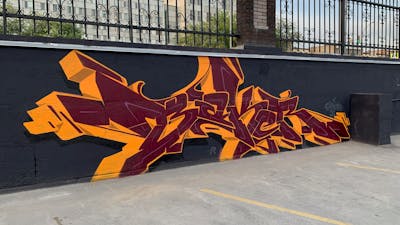 Orange and Black and Red Stylewriting by Bakeroner and Baker. This Graffiti is located in Novosibirsk, Russian Federation and was created in 2021.
