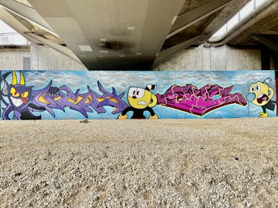 Colorful and Light Blue Stylewriting by News and Sonic. This Graffiti is located in Regensburg, Germany and was created in 2023. This Graffiti can be described as Stylewriting and Characters.