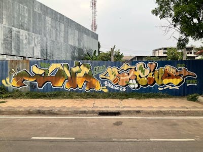 Beige and Brown Stylewriting by Hootive and BNK52. This Graffiti is located in Thailand and was created in 2024. This Graffiti can be described as Stylewriting and Street Bombing.