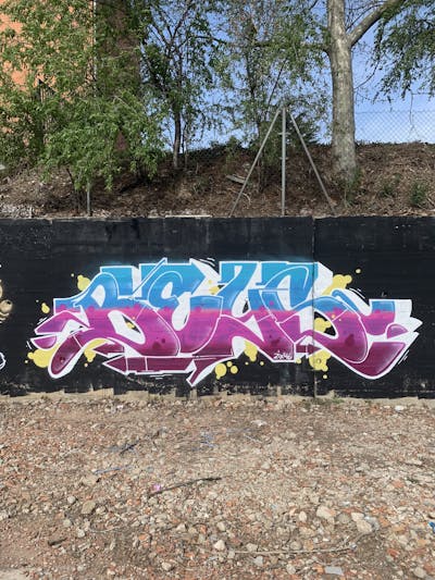 Violet and Light Blue and White Stylewriting by Beys. This Graffiti is located in Barcelona, Spain and was created in 2023.