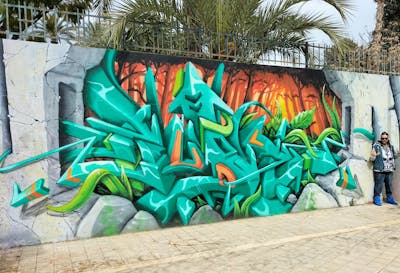 Cyan and Orange Stylewriting by Rudiart. This Graffiti is located in Alicante, Spain and was created in 2022. This Graffiti can be described as Stylewriting, 3D and Murals.