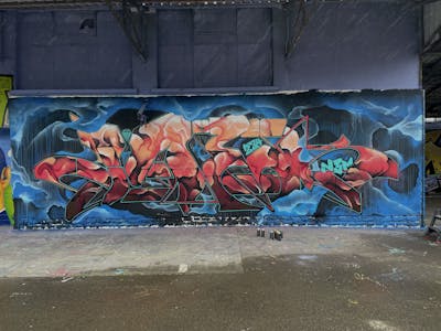Coralle and Red and Blue Stylewriting by N3M crew and Jaek. This Graffiti was created in 2023 but its location is unknown. This Graffiti can be described as Stylewriting and Wall of Fame.