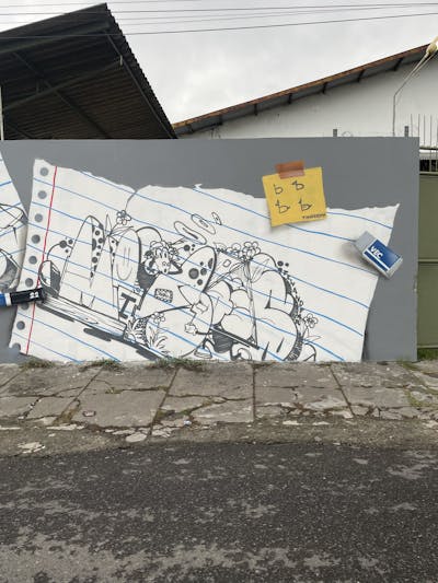 Grey and White and Light Blue Stylewriting by Minas. This Graffiti is located in Yogyakarta, Indonesia and was created in 2022. This Graffiti can be described as Stylewriting and Characters.