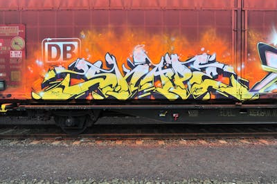 Yellow and White and Orange Stylewriting by S.KAPE289 and Skape289. This Graffiti is located in Germany and was created in 2018. This Graffiti can be described as Stylewriting, Trains and Freights.