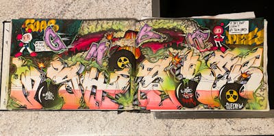 Colorful Blackbook by Srek. This Graffiti is located in Germany and was created in 2023. This Graffiti can be described as Blackbook.