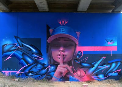 Coralle and Light Blue Stylewriting by Bublegum and Zurik. This Graffiti is located in Barcelona, Spain and was created in 2022. This Graffiti can be described as Stylewriting, Characters, 3D and Abandoned.