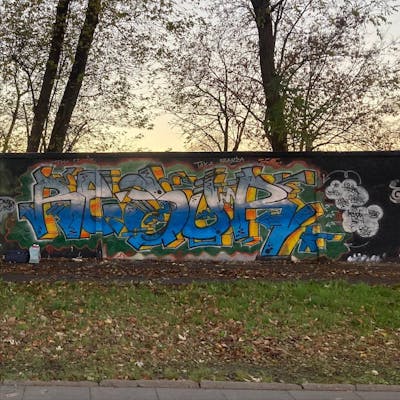 Blue and Grey and Yellow Stylewriting by RESOR. This Graffiti is located in Warszawa, Poland and was created in 2022. This Graffiti can be described as Stylewriting and Wall of Fame.